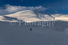 Descending from the Emparis plateau on snowshoes