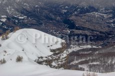 Cliff overlooking the Guillestre valley, behind the head of Vautisse