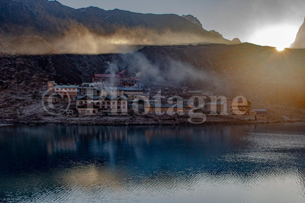 Gokyo, mist and rising sun