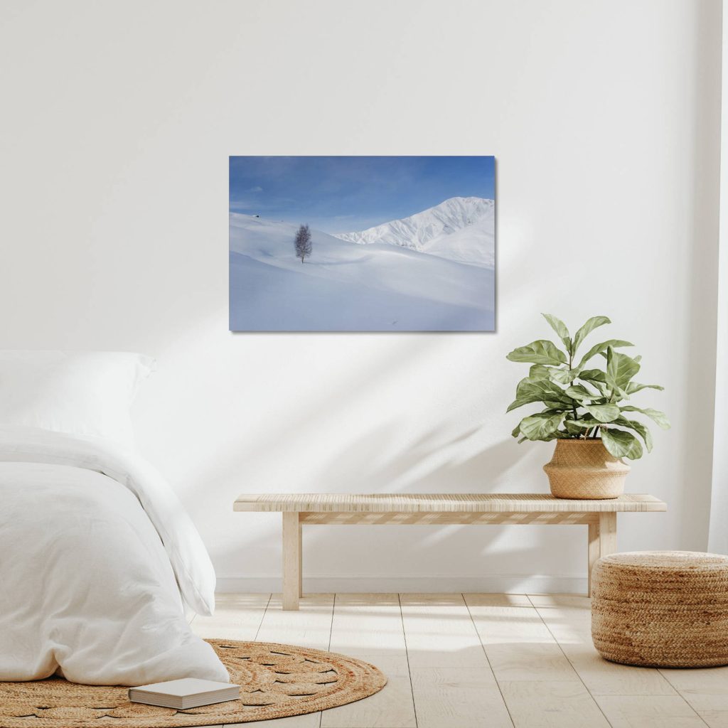 Print of a mountain photograph on canvas on a wooden frame